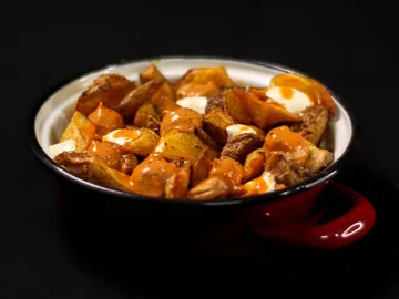 Patatas Muy bravas de Impala Burger & Wings