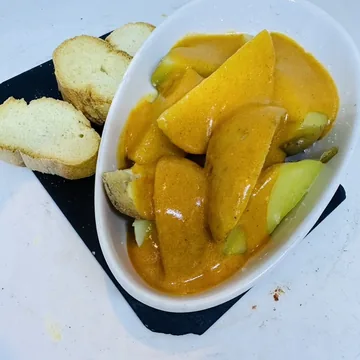 Papas mojo picón de Pizzería Vianco